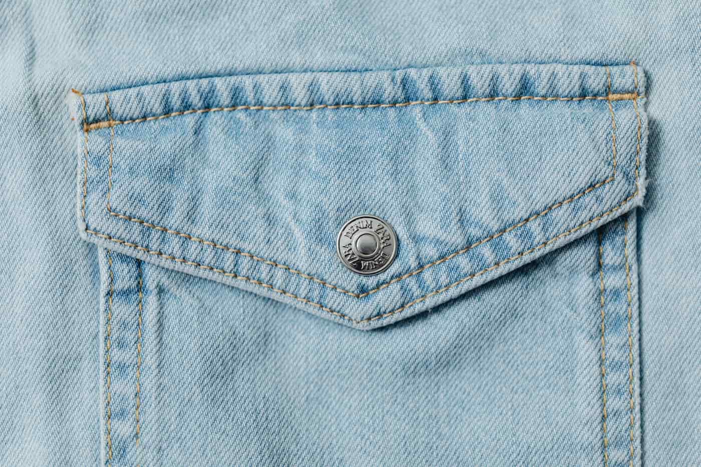 A close view of a denim pocket and its stitching
