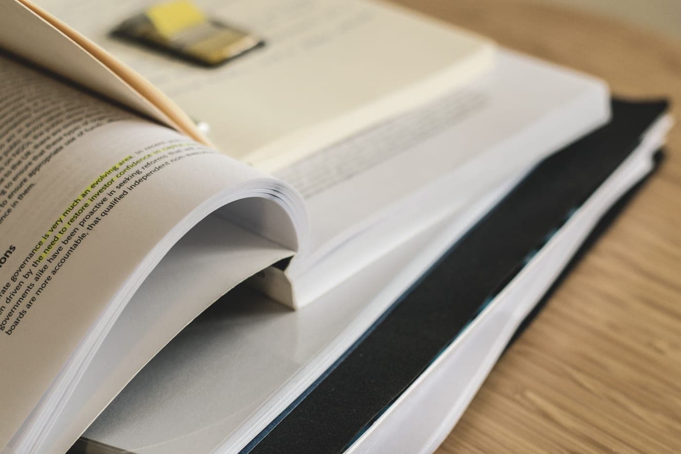 A stack of printed pages on a desk