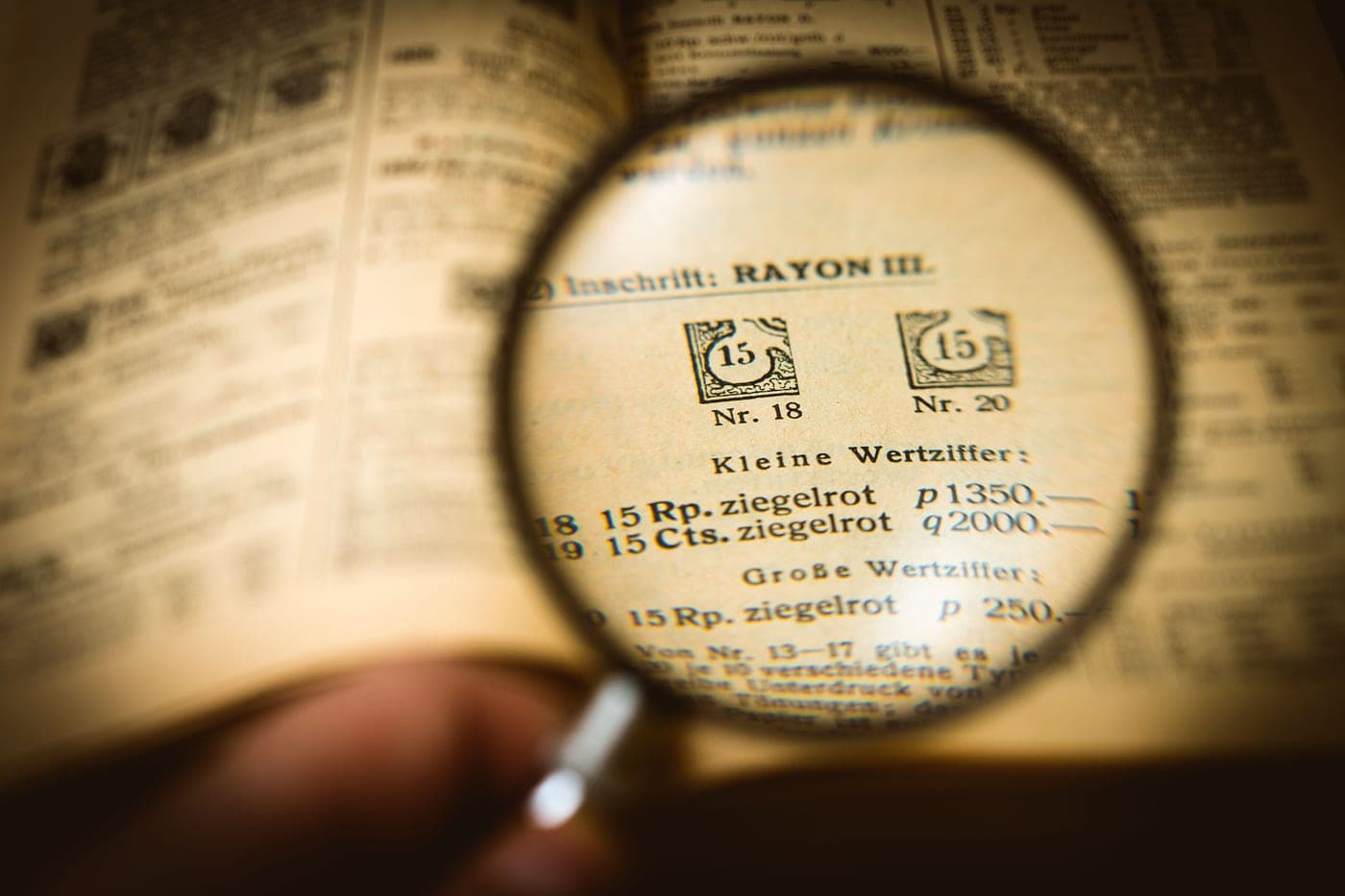 A magnifying glass held over a printed document