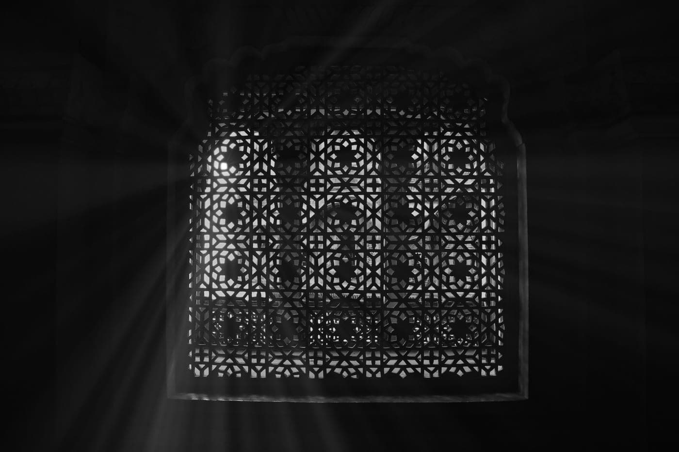 Rays of light passing through a window into a dark room