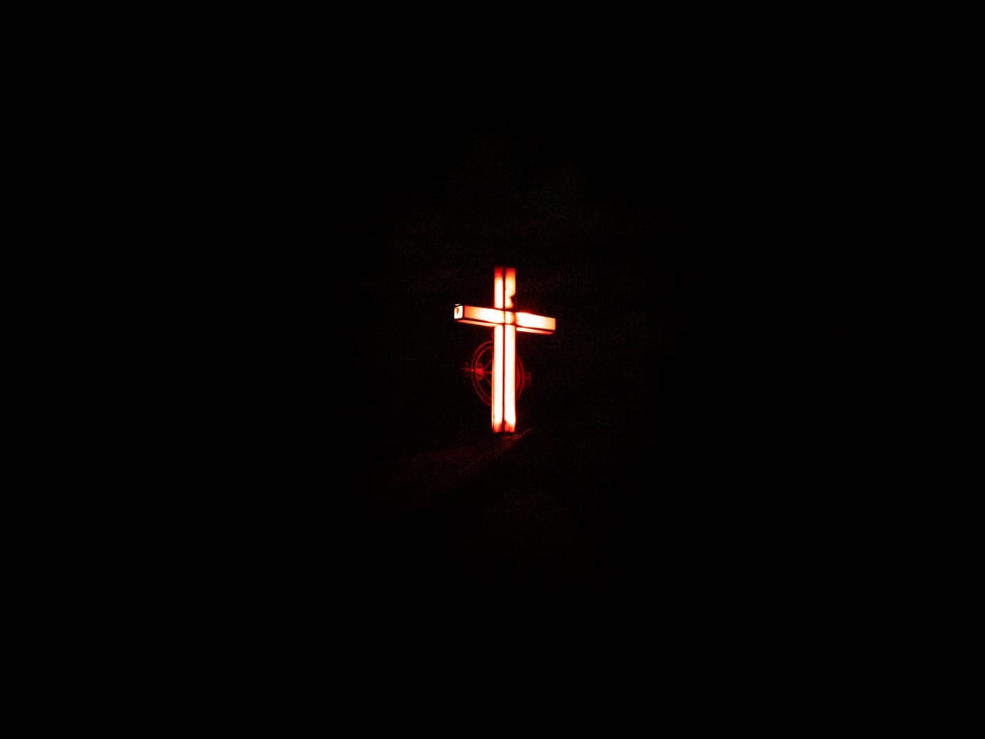 A red glow illuminating the dark